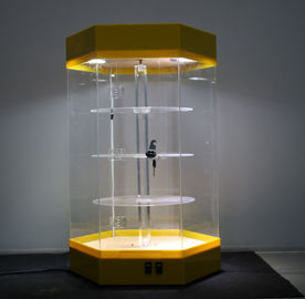 China Beautiful Rotatable Acrylic Display Stands Rack Yellow Base Lockable With Led Light supplier