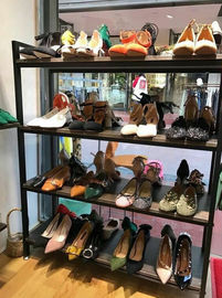 China Black Modular Shoe Store Display Shelves Stable Structure For Shoe Specialty Stores supplier